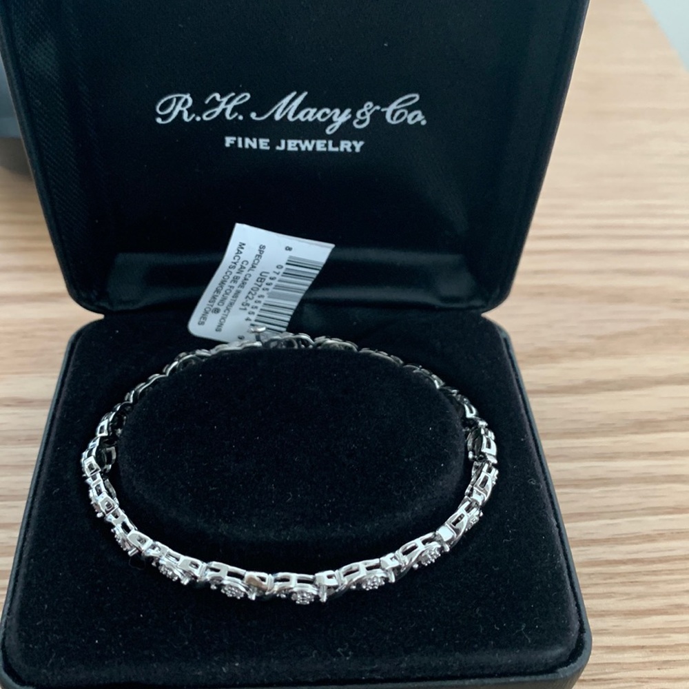 RH Macys brand new sterling silver diamond bracelet. Never been used.
